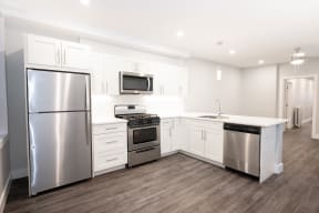 A kitchen at a two-bedroom suite for rent in Winnipeg at 883 Grosvenor Avenue