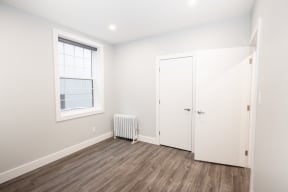 A bedroom at a two-bedroom suite for rent in Winnipeg, MB