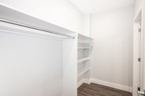 A walk-in closet at a two-bedroom suite for rent in Winnipeg
