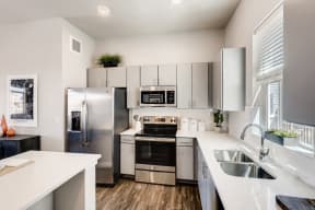 Fully Equipped Kitchen With Modern Appliances at Avilla Buffalo Run, Commerce City, Colorado