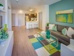 a living room with a couch and a table