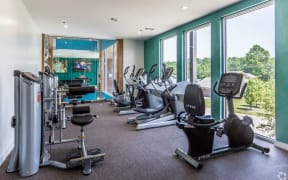 gym with cardio equipment at the preserve at great pond apartments in windsor locks, ct