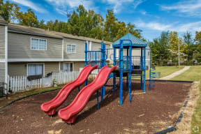 our apartments have a playground with slides and playset