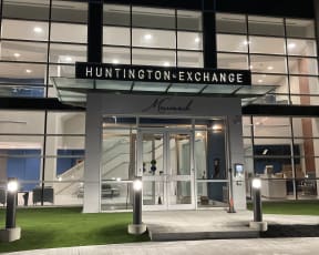 the entrance to the huntington innovation center at night