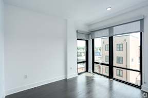 Secondary bedroom with floor to ceiling windows