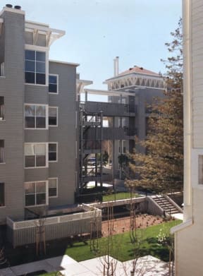 a view of an apartment building from a balcony