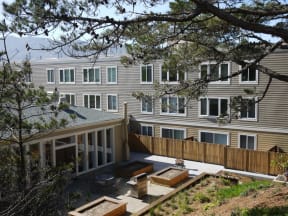 a view of the back of a house with a patio