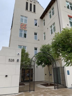 a building with a gate in front of it