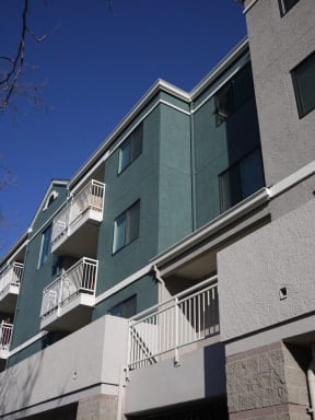 an exterior view of an apartment building with balconies