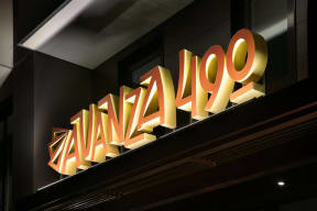 a sign for a walgreens drugstore on the side of a building