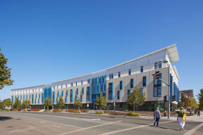 a rendering of the building at the corner of a street