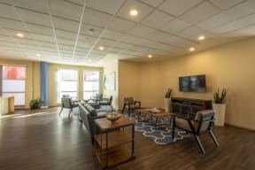the preserve at ballantyne commons living room with furniture and a television