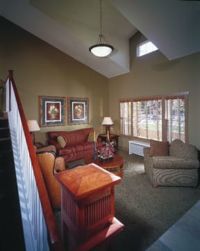 a living room with a couch and a table