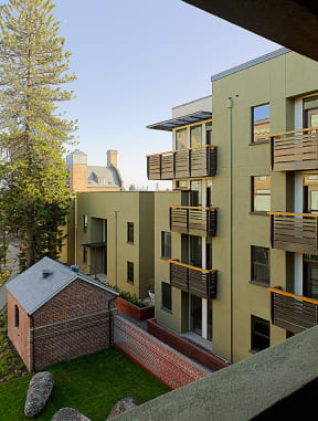 a view of an apartment building from a balcony