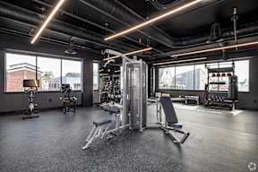 A Gym With Squat Rack at Hue Soul Apartments, New Jersey, 07018