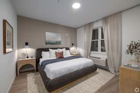 A Modern Bedroom at Hue Soul Apartments, New Jersey