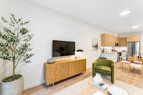 A Living Room With a TV at Hue Soul Apartments, New Jersey, 07018