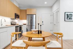 A Kitchen With a Refrigerator at Hue Soul Apartments, East Orange