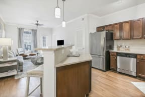 Island Kitchen With Living Room View at The Residence at Marina Bay, Irmo
