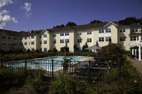 Garden Courtyard and Pool View at The Kentshire Senior Apartments in Midland NJ