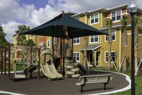 Playground at Colonial Lakes Apartments in Lake Worth, FL