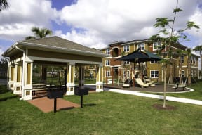 Picnic and BBQ area at Colonial Lakes Apartments in Lake Worth, FL
