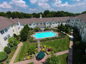 Garden Courtyard and Swimming Pool at The Kentshire Senior Apartments in Midland NJ