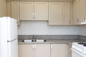 Kitchens with Granite Countertops at Sycamore Senior Affordable Apartments in Oxnard CA