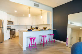 Stylish kitchen with breakfast bar at The Chandler in North Hollywood