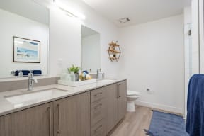 Double sink vanity with plenty of storage in the bathroom at The Chandler in North Hollywood