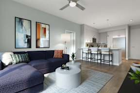 A living room with a purple couch and a white coffee table.