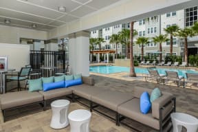 Covered Veranda at Epic at Gateway Luxury Apartments in St. Petersburg, FL