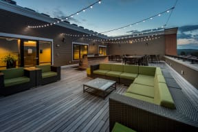 Outdoor couches on community roof deck | The Merc at Moody and Main