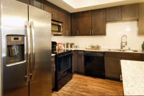 Kitchen with espresso cabinetry | Barcelona Jupiter