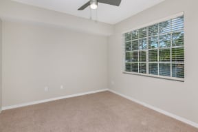 Bedroom with plush carpeting |Ashlar Fort Myers