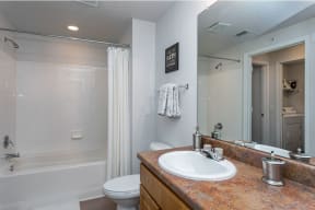 Bathroom with tile surround  |Cypress Legends