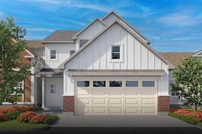 A modern house with a white garage door at Walker Place Apartments, Hewitt