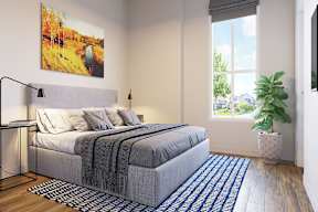 Bedroom with cozy bed at Walker Place Apartments, Hewitt