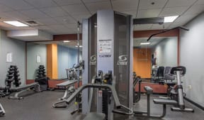 Fitness center features cardio equipment and free weights |Residences at Manchester Place
