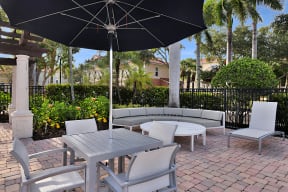 Poolside patio and lounge area | Floresta