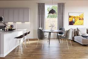 A modern kitchen with a dining table and chairs at Walker Place Apartments, Texas, 76643