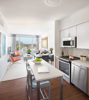 Kitchen with stainless steel appliances| The Merc at Moody and Main