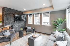Living Room With TV at Vista Apartments at Edgemont, Edmonton Alberta
