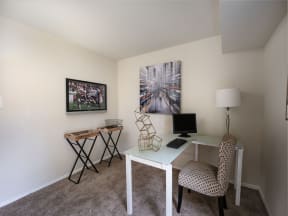 a home office with a white desk and chair at The Glendale Residence, Lanham