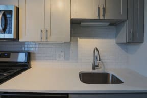 Sink With Faucet at Flats of Forestville, Forestville, Maryland