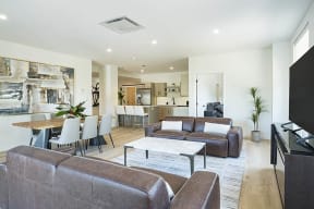 a living room with couches and a table