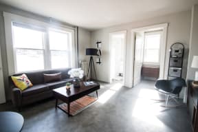a living room with a couch and a coffee table