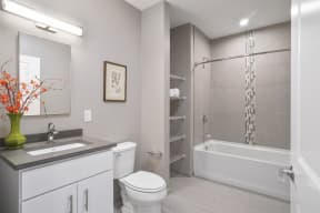 a bathroom with a toilet sink and bathtub
