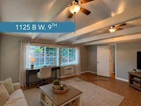 Digitally staged living room with exposed beams and work desk at OSM Properties Homes & Apartments, Chico, 95926