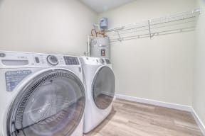 a washer and dryer in the laundry room